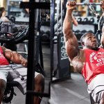 Подъем рук перед собой с нижнего блока сидя на наклонной скамье